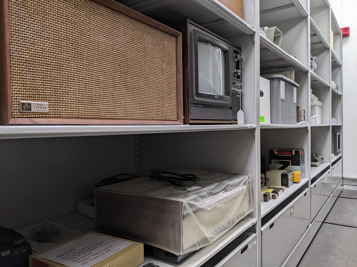 Storage shelves filled with electronic equipment