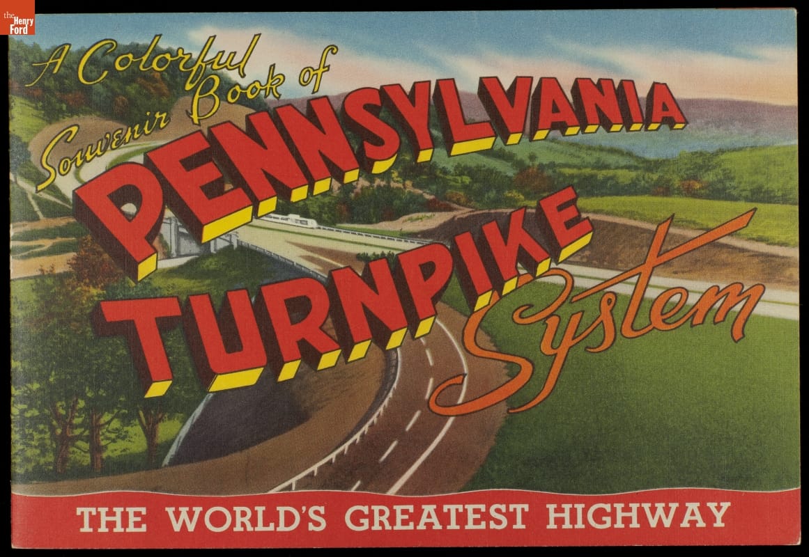 Colorful landscape with road traveling through it; overlaid with text