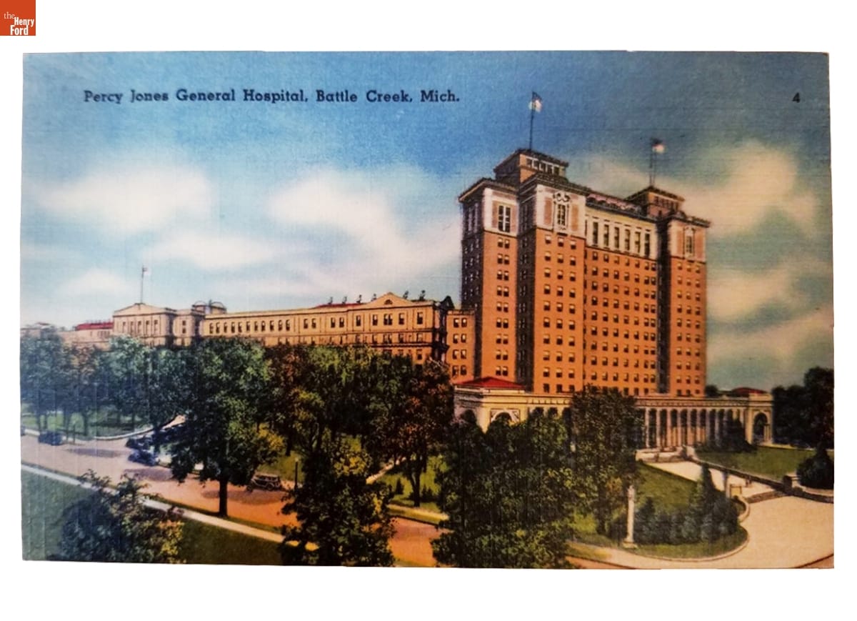 Percy Jones General Hospital Postcard, Sent Home from Fort Custer Military Training Base, August 12, 1944 Color illustration of large red brick building with road and trees in front; contains text