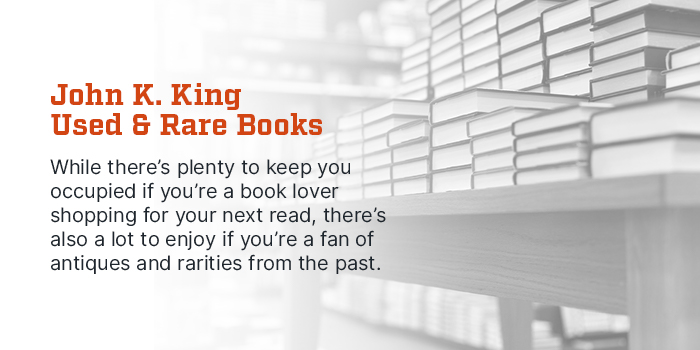 John K. King Used & Rare Books Detroit, MI. While there's plenty to keep you occupied if you're a book lover shopping for your next read, there's also a lot to enjoy if you're a fan of antiquities and rarities from the past. Photo of stacked books on a table.