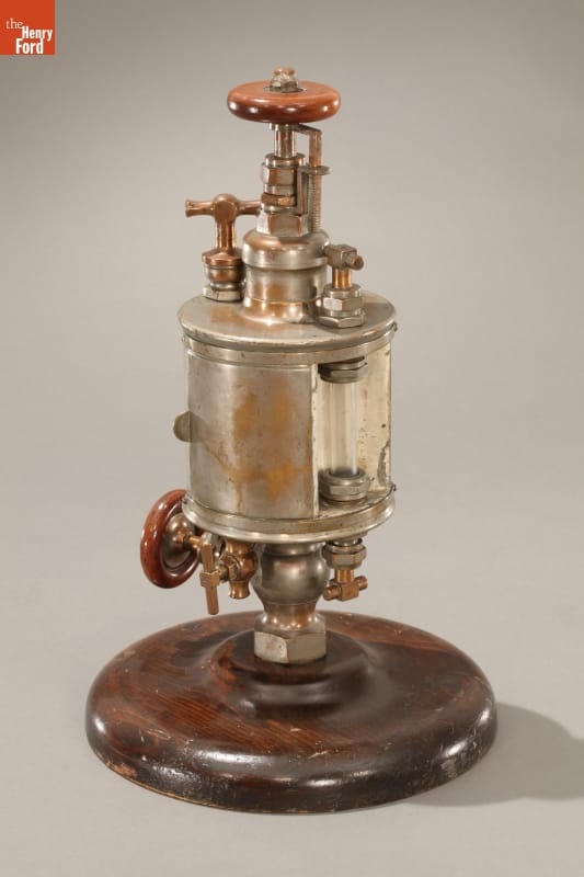 Brass machine with various knobs and fittings