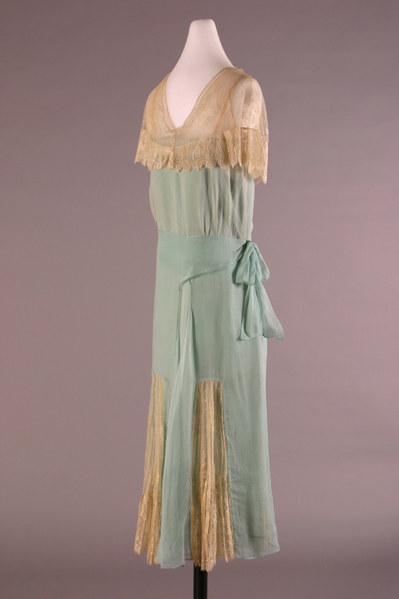 Pale blue dress with beige lace and skirt gores