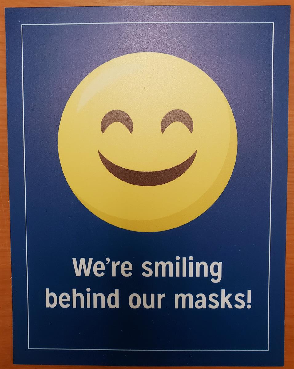 Yellow "smiley face" emoji; also contains text