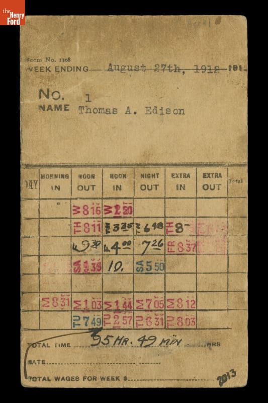 Card with printed form filled out with typed, handwritten, and stamped text.