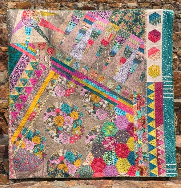 Multi-colored quilt with complex design