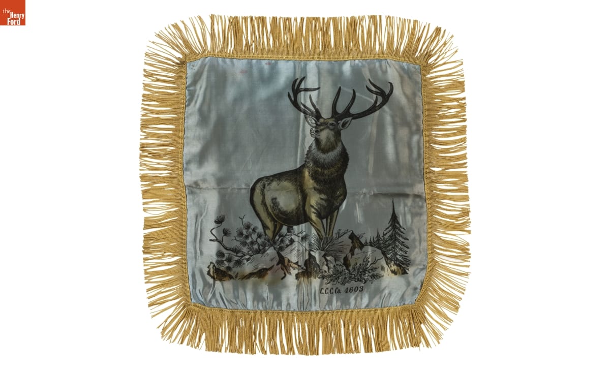 White or gray satin pillowcover with image of deer and gold fringe