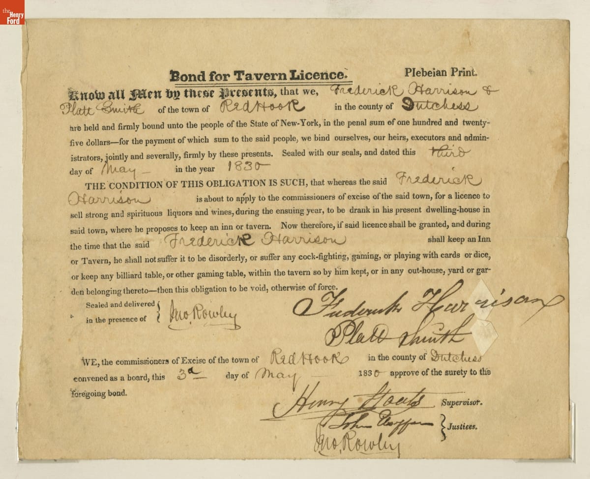 Page containing printed and handwritten text, along with signatures