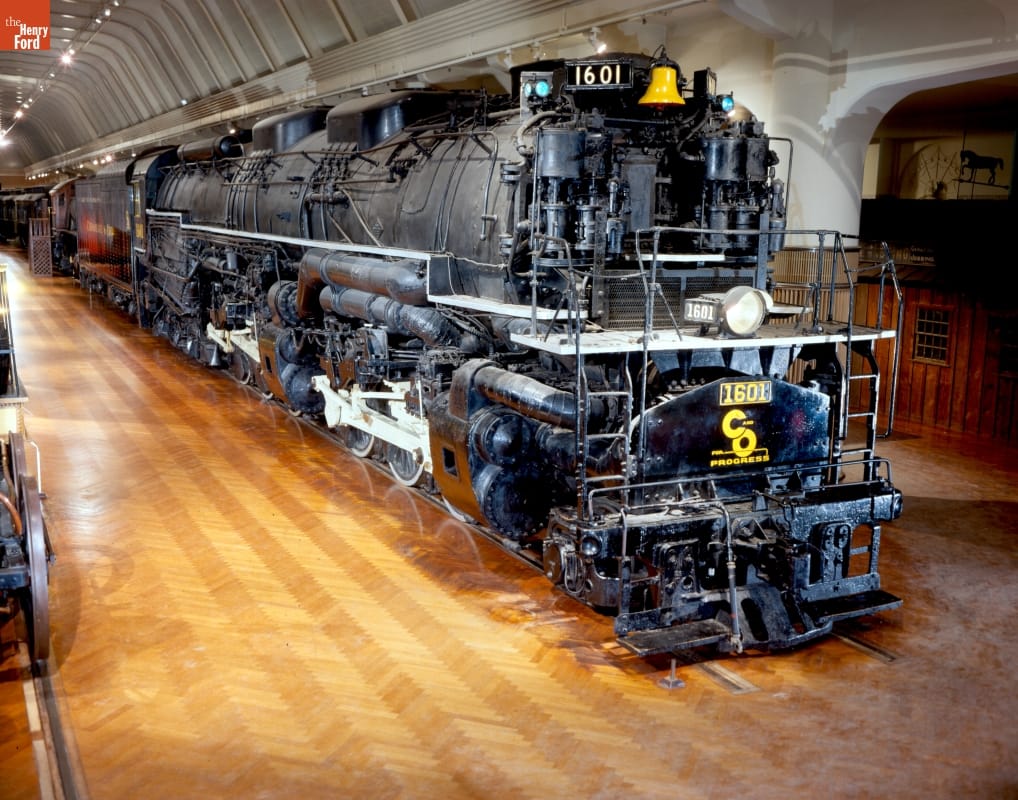 Allegheny Steam Locomotive, 1941 Large black locomotive in large room with wood floor and arched ceiling
