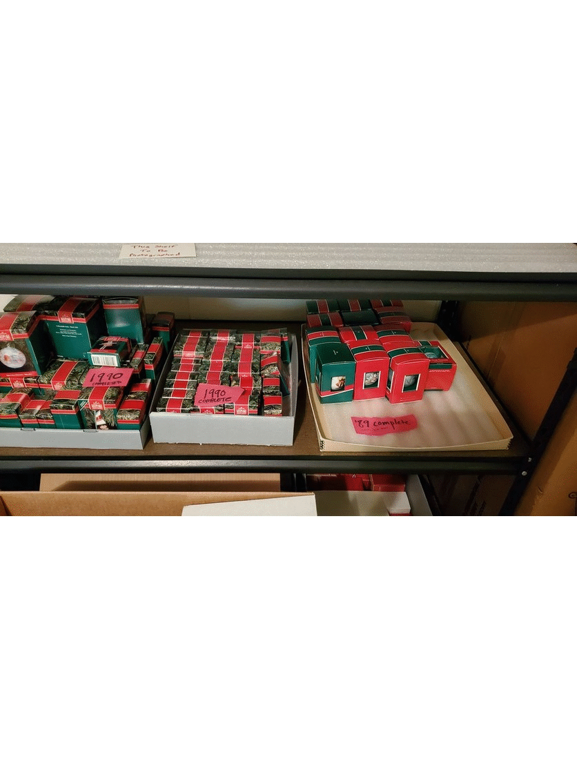 GIF cycling through three images of small red and green boxes in larger gray boxes