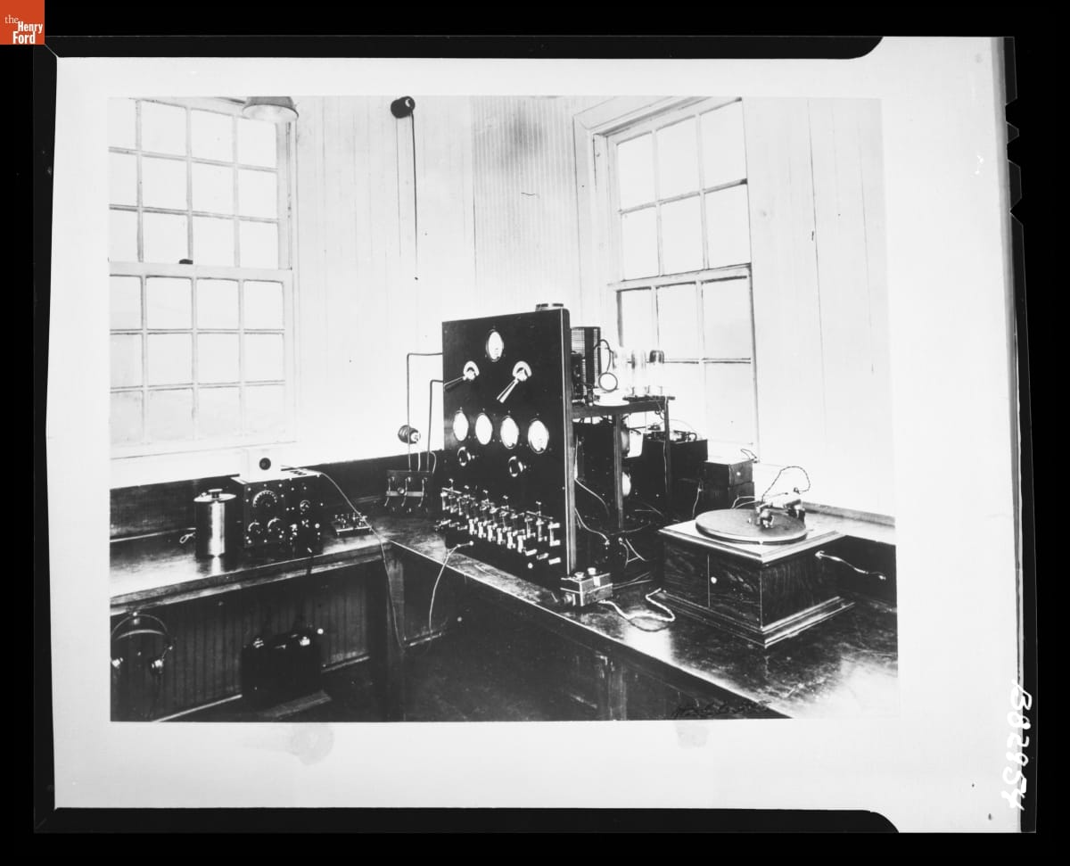 Equipment with dials and wires on table in windowed room