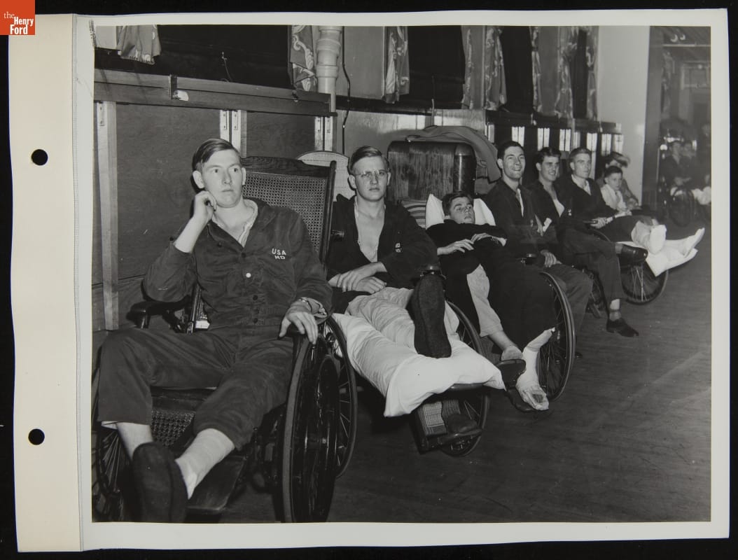 Row of men in wheelchairs
