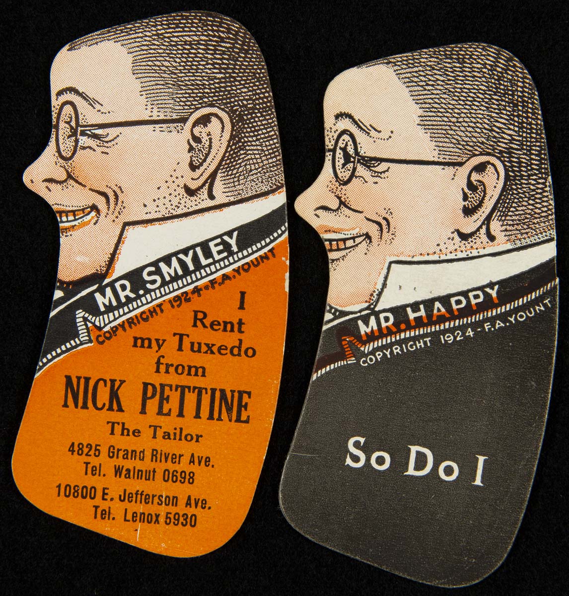 Two cards, almost touching each other, shaped like torso and face of a man, one wearing an orange coat and one a black coat; contains text
