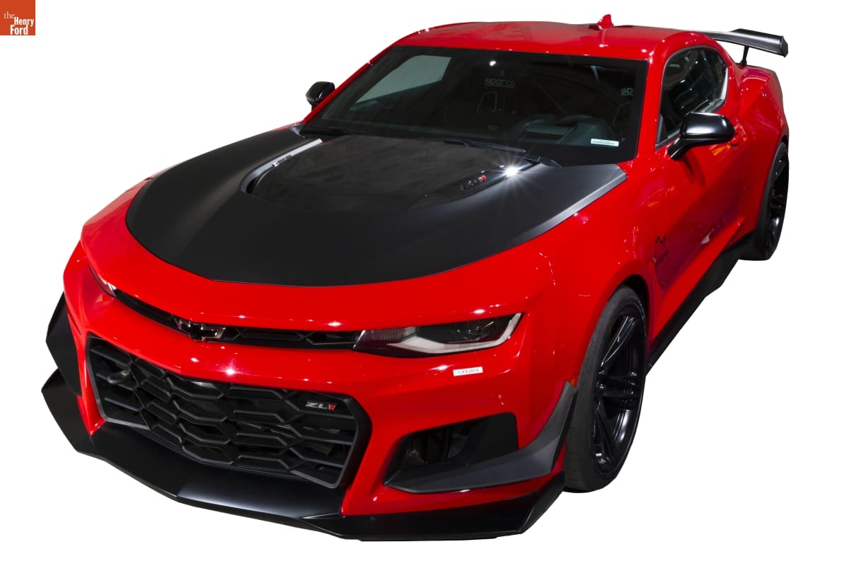 Red sportscar with black hood