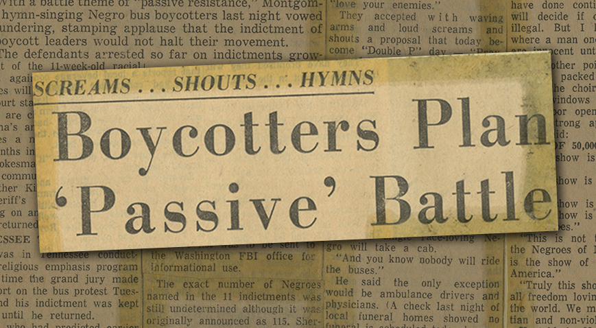 Newspaper headline enlarged over background of yellowed newspaper article text