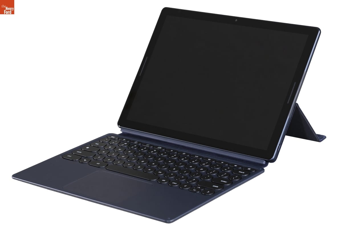 Black tablet computer with keyboard and stand