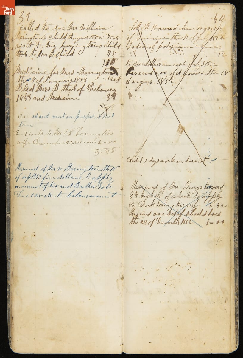 Narrow notebook containing handwritten cursive text, some X-ed out