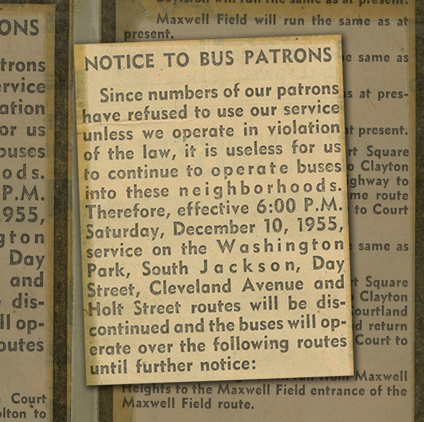 Newspaper headline enlarged over background of yellowed newspaper article text